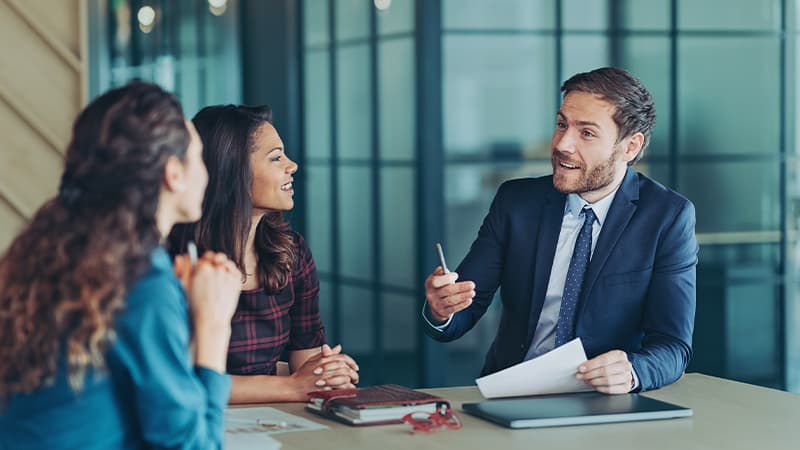 Professional Man Having A Meeting With Two Women